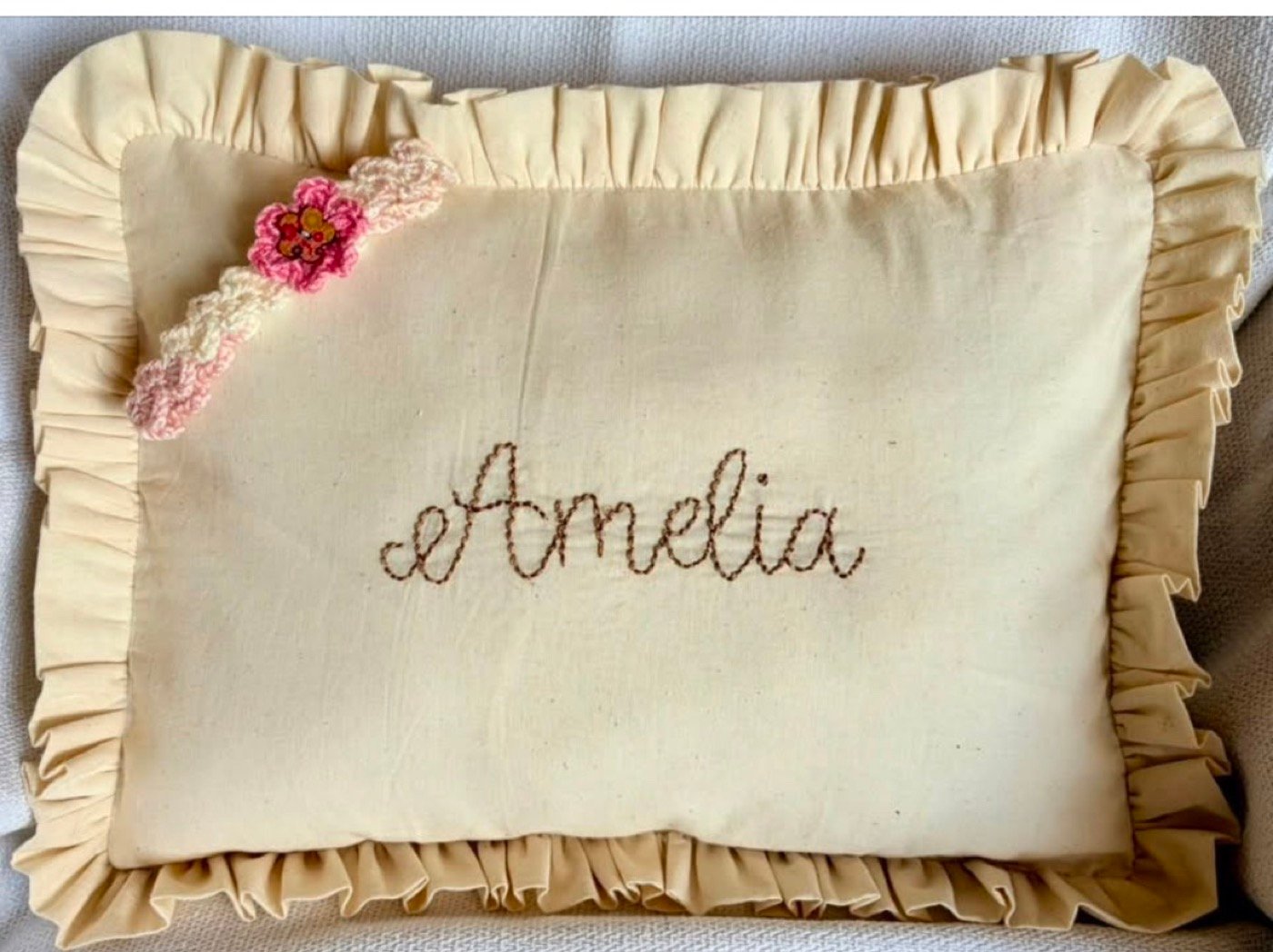 Embroidered name cushion